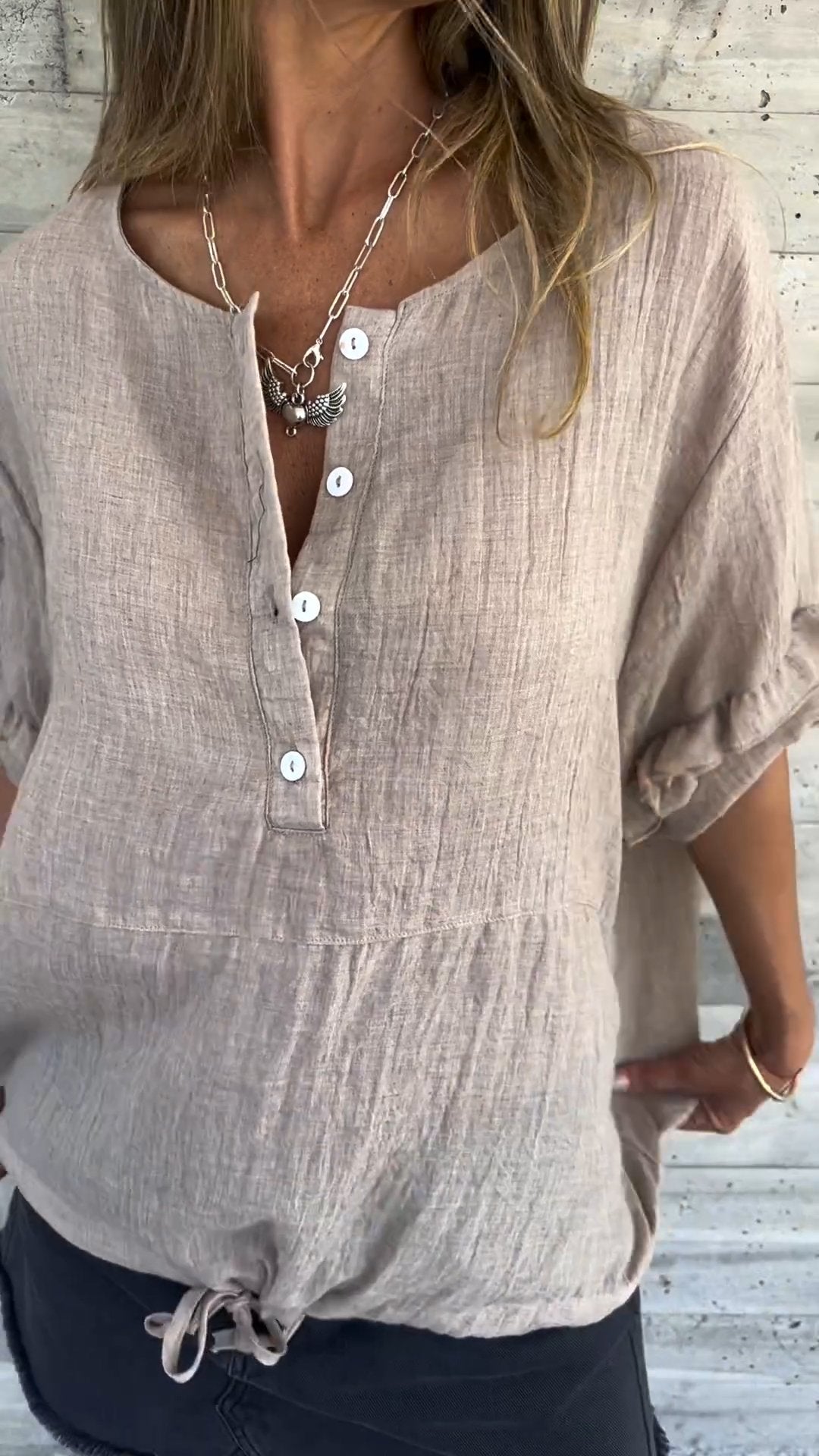 Blusa com Gola Redonda e Barra de Amarrar